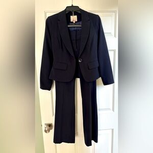 Navy/midnight blue suit jacket and pants.
